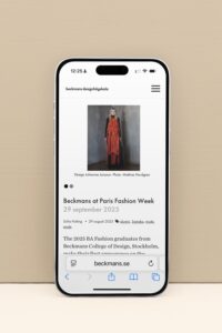 iPhone-med-bild-på-beckmans-hemsida
