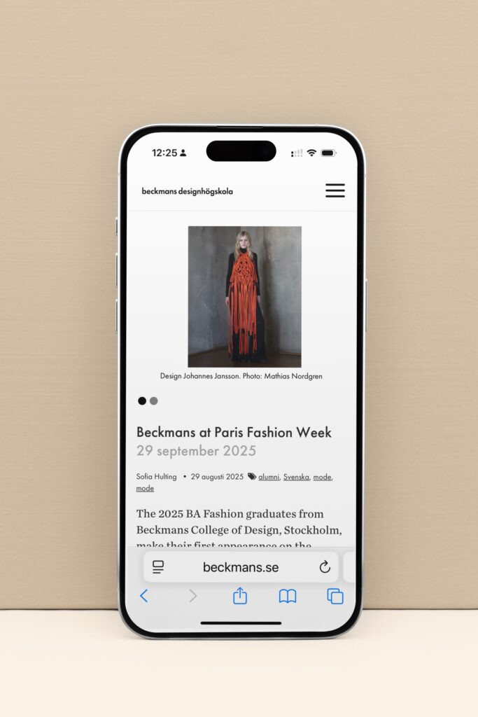 iPhone-med-bild-på-beckmans-hemsida