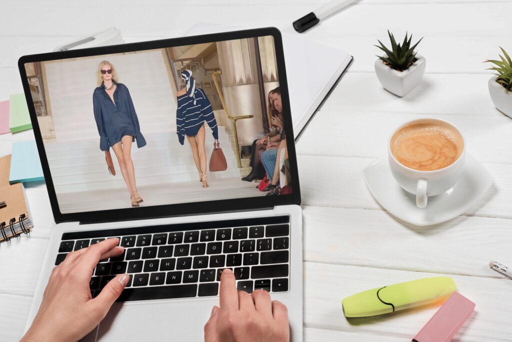 woman-watching-fashion-on-laptop